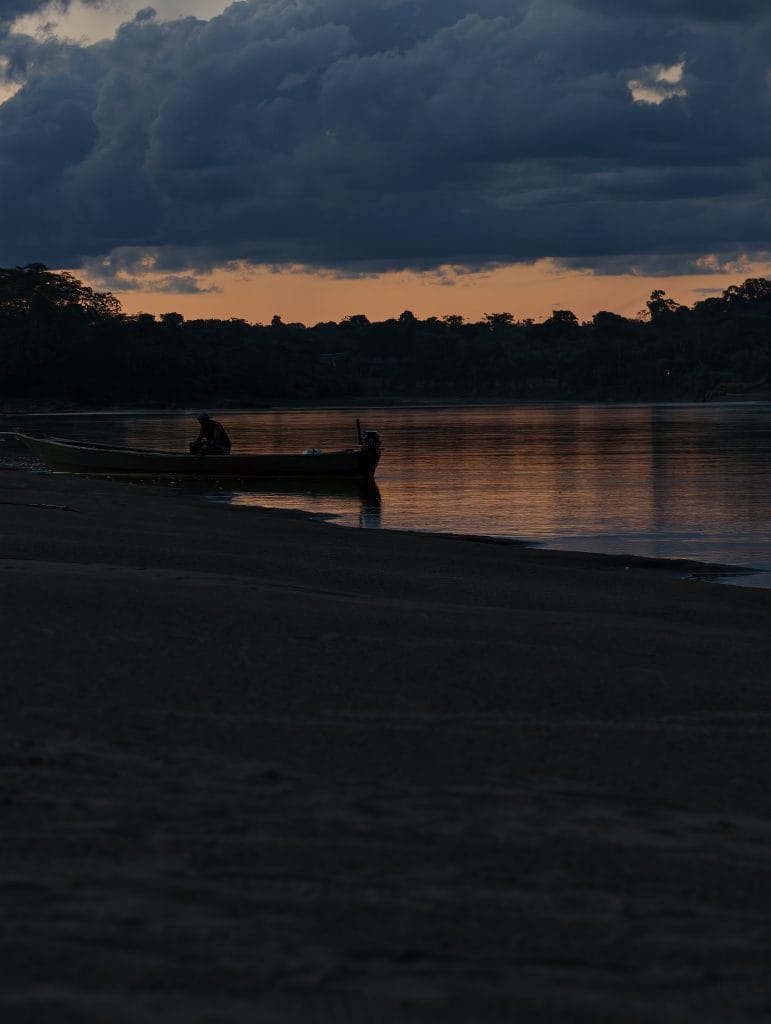Sunset over the tambopata river, puerto maldonado trip, peru