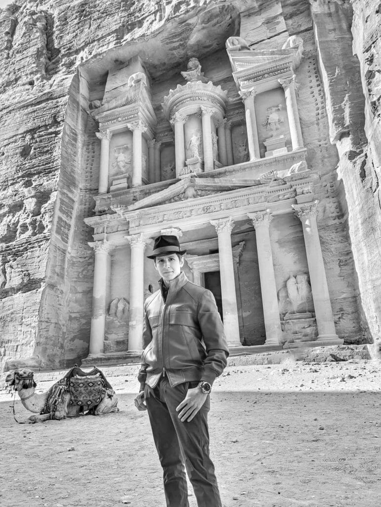 Scoot and a camel pose in front of the treasury during a visit to Petra, Jordan