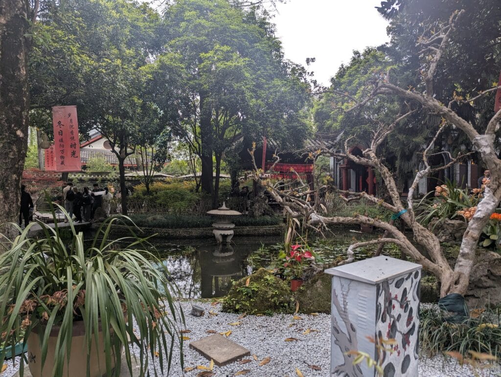 People's park in Chengdu, with a lake and activity