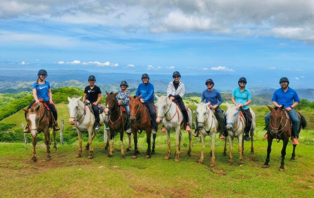 Multigenerational family horseback riding in Monteverde Costa Rica