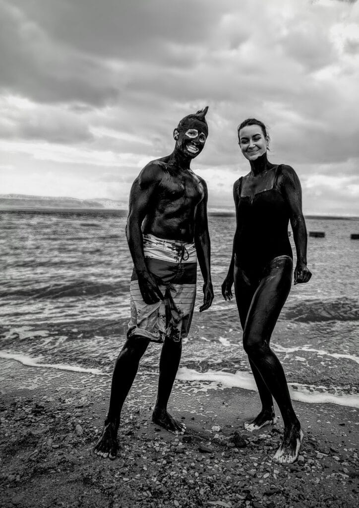 Scoot and Z covered in dead sea mud at Hilton resort Jordan