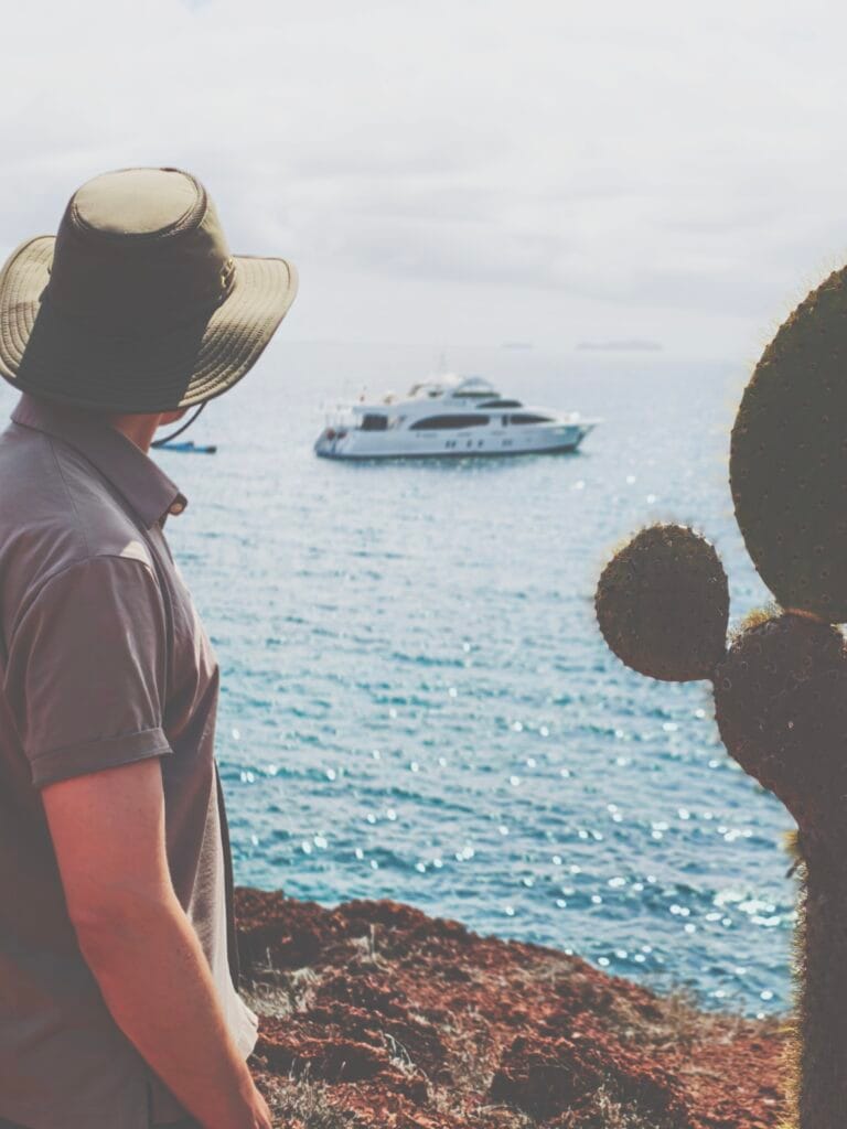 Scoot looks out to the yacht on a galapagos islands cruise review