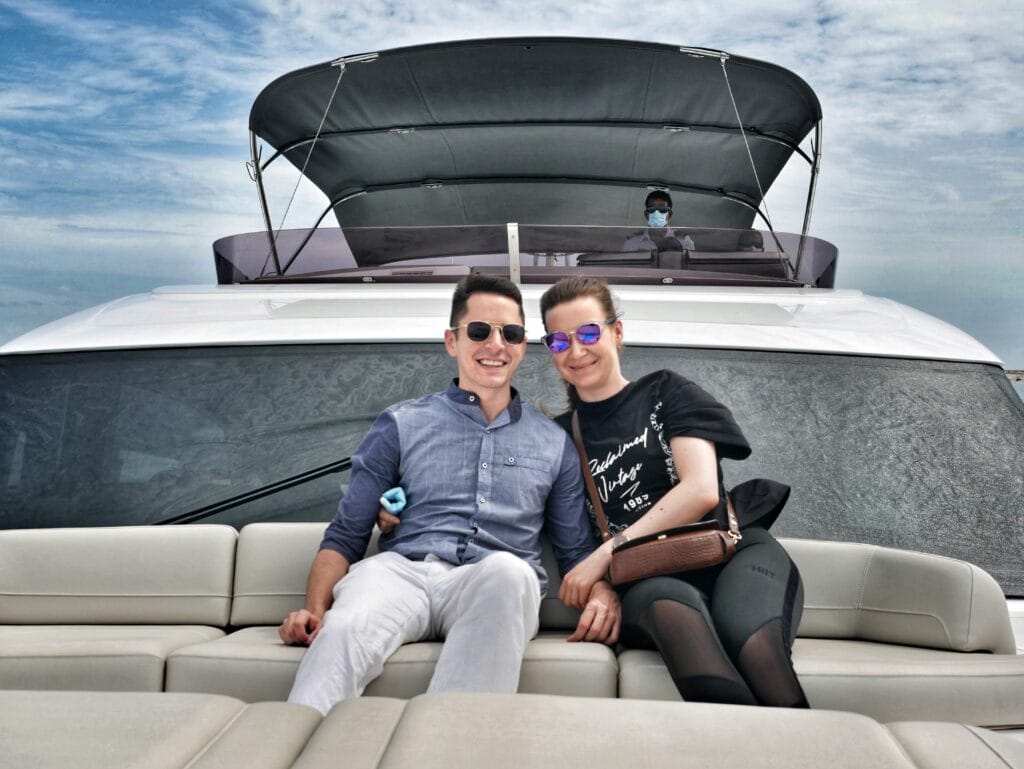 Scoot and Z arriving at Waldorf Astoria Maldives on a luxury yacht.