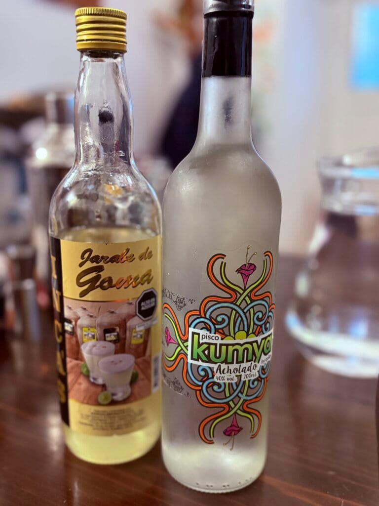 Traditional Peruvian pisco sour cocktail on a restaurant table in Cusco Peru