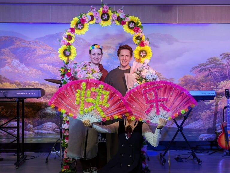 Scoot and Z on stage at North Korean Restaurant in Shanghai
