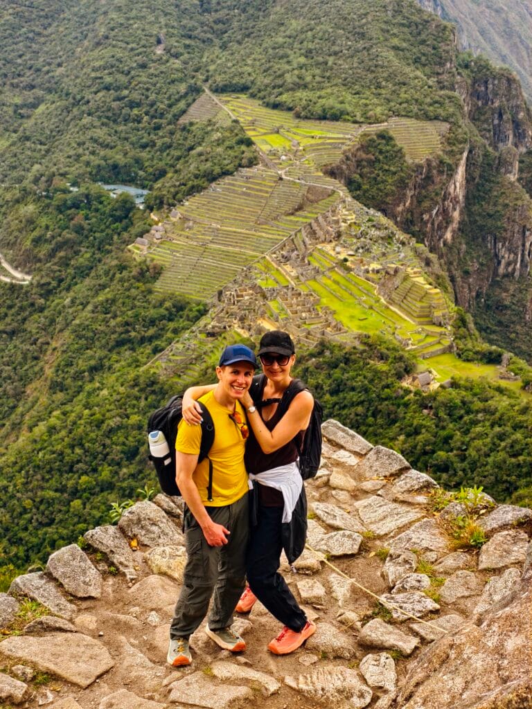 Scoot and Z posing at the summit of Huayan Picchu