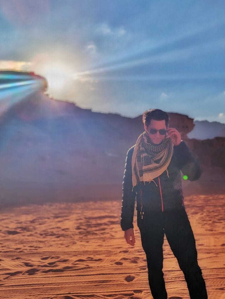 Scoot in Wadi Rum desert with sun shining in Jordan