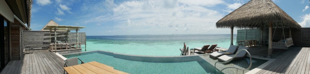 Panorama of private pool at Waldorf Astoria Maldives overwater bungalow.